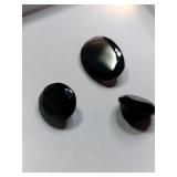 3 Brown simulated gems