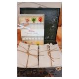 Metal case with vintage paper plus Swizzle Sticks