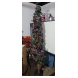 Tall skinny Christmas tree with decorations 6.5ft