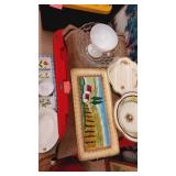 Large group of serving platters plus even a pet