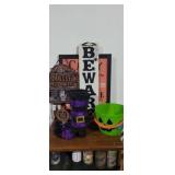 Halloween signs and witches boots and light up