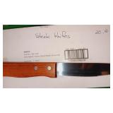 Set a 6 Winco steak knifes new in the box