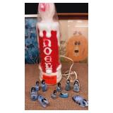 Plastic NOEL lighted candle & Mexican miniature