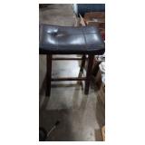 Wooden stool with leather seat