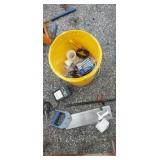 Bucket with nails , saw, solder, tire iron and
