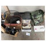 Tarps, books, toolbox, wire fruit baskets and