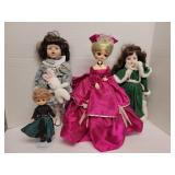 4 dolls on stands 16in
