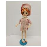 Vintage posable doll on stand 16in may be a