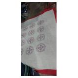 Red white and blue quilt with cross stitch