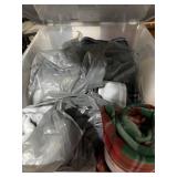 Tote of new fleece throws