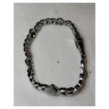 Silver bracelet with hearts marked 925.   .465oz