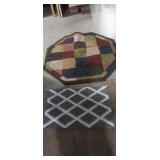 Octagonal multi colored area rug 4ft d, and
