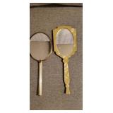 Two antique handheld mirrors. Beautiful patterns.