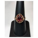 10K ruby ring marked 10k size 7 .110oz