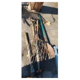 Shovel, pitchforks, log roller, and pickaxe