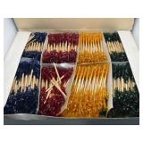 Almost full case of frilled toothpicks