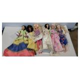 6 assorted barbie dolls