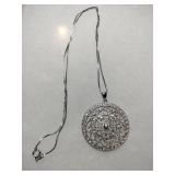 Silver necklace and pendant marked 925.   .345oz