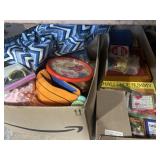 Vintage board games and mix of new pool floats