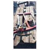 Large log hand saw, bit braces, cast iron pully