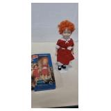 Annie porcelain doll 10in and doll on original