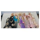 5 assorted barbies