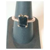 Gold tone dark  Stone ring unmarked  size 8