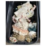 Tote of porcelain dolls, clothing, parts