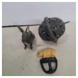 Modern cast iron pig hook, rabbit bank, and