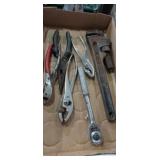 Rigid twelve inch pipe pliers and socket wrench