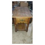 Drop leaf side table with drawer