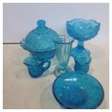 Assorted blue glassware