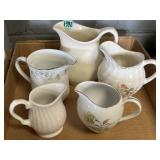 Marked and unmarked creamers, Germany, Japan