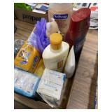 Flat of soap bars, body wash, and a loofah