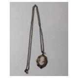 12 K  gold chain 12K GF pendant.    .115oz