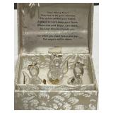 Three angels in a "worry box