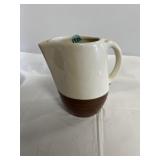 Unmarked vintage two-toned pottery water jug