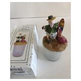 Glass candle holder with topper and candle