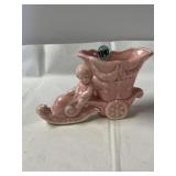 Unmarked pink ceramic planter, shaped as a cherub