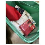 Tote of table cloth, place mats and towels