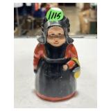 vintage cast metal Amish woman coin bank w/