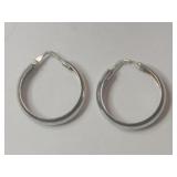 Silver hoop earrings marked 925.   .105oz