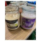 Two 18 oz jar candles one creamy vanilla swirl,
