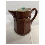 Unmarked vintage brown glazed stoneware pitcher