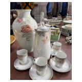 Floral tea set marked Germany 12, 10 pieces total