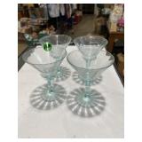 Set a four aqua blue sherbet glasses, small chip