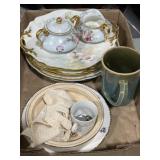 Mix of painted porcelain and stoneware mug