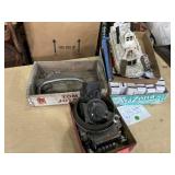 Vintage car parts, wood crate, and other