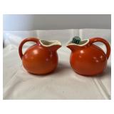 Pair of vintage orange ball mini pitchers /
