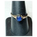 Gold  blue stone ring marked ARO  size 8.